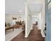 Inviting foyer with dark wood floors, neutral walls, and an open view into the dining and kitchen areas at 270 Park Bridge Ln, Roswell, GA 30075