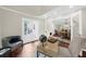 Bright office space features hardwood floors, lots of light, and glass doors leading to outdoor deck at 270 Park Bridge Ln, Roswell, GA 30075