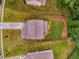 Aerial view of the property featuring a well-manicured lawn and fenced backyard at 510 Curry Ridge Ct, Locust Grove, GA 30248