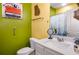 Well-lit bathroom with modern fixtures, a vanity, and decorative accents, blending functionality with style at 510 Curry Ridge Ct, Locust Grove, GA 30248