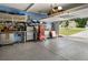 Well-organized garage with epoxy floor, ample storage, and an automatic door at 510 Curry Ridge Ct, Locust Grove, GA 30248