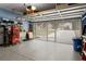 Well-organized garage with epoxy floor, ample storage, and an automatic door at 510 Curry Ridge Ct, Locust Grove, GA 30248