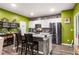 Spacious kitchen featuring granite countertops, stainless steel appliances, and an island with barstool seating at 510 Curry Ridge Ct, Locust Grove, GA 30248