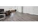 Spacious basement showcasing wood-look flooring and natural light at 1048 Indian Hills Pkwy, Marietta, GA 30068