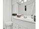 Bathroom featuring a vanity with sink, toilet, and shower/tub at 1048 Indian Hills Pkwy, Marietta, GA 30068