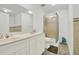 Bathroom with double sink vanity, walk-in shower, and modern fixtures at 1048 Indian Hills Pkwy, Marietta, GA 30068