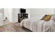 Bedroom featuring natural light and wood-look floors at 1048 Indian Hills Pkwy, Marietta, GA 30068