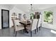 Stylish dining room featuring a contemporary light fixture and built-in display shelves at 1048 Indian Hills Pkwy, Marietta, GA 30068