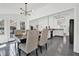 Elegant dining area with backyard view and open floor plan to the kitchen at 1048 Indian Hills Pkwy, Marietta, GA 30068