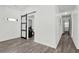 Hallway featuring unique barn door detail leading to another room at 1048 Indian Hills Pkwy, Marietta, GA 30068