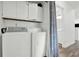 Laundry room with washer, dryer, and ample storage space at 1048 Indian Hills Pkwy, Marietta, GA 30068