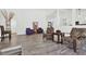 Open-concept living room showcasing stylish furnishings, clerestory windows and a seamless flow to the kitchen at 1048 Indian Hills Pkwy, Marietta, GA 30068