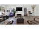 Bright living room featuring a modern fireplace, clerestory windows, and stylish decor with comfortable seating at 1048 Indian Hills Pkwy, Marietta, GA 30068