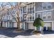 Exterior of townhomes, showcasing attached garages and well maintained landscaping at 1107 Park Row South Se, Atlanta, GA 30312
