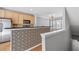 Kitchen featuring wood cabinets, stainless steel appliances, decorative island, and hardwood floors at 1107 Park Row South Se, Atlanta, GA 30312