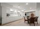Finished basement area with a modern kitchenette and dining space, great for entertaining at 4108 Wyndam Hill Dr, Suwanee, GA 30024