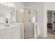 This bathroom features a standup shower, bright lighting, and neutral walls at 4108 Wyndam Hill Dr, Suwanee, GA 30024