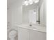 Clean and bright bathroom featuring a large mirror, white vanity, and tub/shower combination at 4108 Wyndam Hill Dr, Suwanee, GA 30024