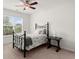 This bedroom features a ceiling fan, window with blinds, and neutral walls at 4108 Wyndam Hill Dr, Suwanee, GA 30024