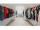 Spacious walk-in closet with ample storage and wire shelving for organization at 4108 Wyndam Hill Dr, Suwanee, GA 30024