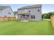 Spacious backyard with large grass area and patio at 537 Garnet Dr, Acworth, GA 30101