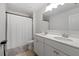 Bathroom with double sink vanity and shower with curtain at 537 Garnet Dr, Acworth, GA 30101