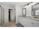 Bathroom with double sinks and glass enclosed shower at 537 Garnet Dr, Acworth, GA 30101