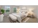 Bedroom featuring a neutral color palette, natural light, and an accent rug at 537 Garnet Dr, Acworth, GA 30101