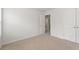 Neutral bedroom showcasing open doorway and closet at 537 Garnet Dr, Acworth, GA 30101