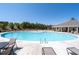 A large community pool area with ample seating and shade, perfect for hot days at 537 Garnet Dr, Acworth, GA 30101