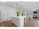 Kitchen island open to living room and dining area at 537 Garnet Dr, Acworth, GA 30101