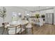 Eat-in kitchen with hardwood floors, stainless steel appliances and a center island at 537 Garnet Dr, Acworth, GA 30101