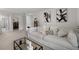 Upstairs living area featuring an L-shaped sofa and neutral tones at 537 Garnet Dr, Acworth, GA 30101