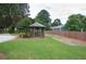A relaxing gazebo overlooking the community yard, perfect for outdoor enjoyment at 942 Village View Cir, Loganville, GA 30052