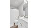 Full bathroom featuring a shower and tub combo, white cabinets, and neutral paint at 10151 Benton Woods Dr, Covington, GA 30014