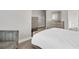 Bedroom with natural light, neutral paint, carpet, and luxury furniture set at 10151 Benton Woods Dr, Covington, GA 30014