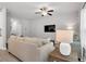Bright living room featuring an open layout with neutral-toned furnishings and modern decor at 10151 Benton Woods Dr, Covington, GA 30014