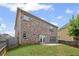 Backyard featuring well-maintained grass and patio at 29 Lankford Rd, Tucker, GA 30084