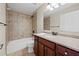 Neutral bathroom with tile shower and granite topped vanity at 29 Lankford Rd, Tucker, GA 30084