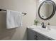Cozy powder room with a modern sink, framed mirror, and elegant vanity at 29 Lankford Rd, Tucker, GA 30084