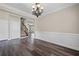 Inviting dining room with detailed trim, chandelier, and wood-look floors, ideal for memorable meals at 29 Lankford Rd, Tucker, GA 30084