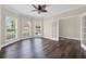 Inviting living room featuring large windows and beautiful wood-look floors, perfect for relaxation and entertaining at 29 Lankford Rd, Tucker, GA 30084