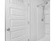 Bathroom including a full shower and white tiling at 4076 Sonoma Wood Trl, Decatur, GA 30034