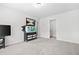 Spacious bonus room with neutral carpet and ample lighting at 4076 Sonoma Wood Trl, Decatur, GA 30034