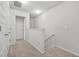 Upstairs hallway with carpeted floors and white trim at 4076 Sonoma Wood Trl, Decatur, GA 30034