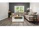 Cozy living room with modern decor and large window at 4076 Sonoma Wood Trl, Decatur, GA 30034