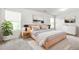 Bright bedroom with neutral decor and a large window at 4076 Sonoma Wood Trl, Decatur, GA 30034