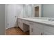Bathroom featuring double sinks, large vanity, and tile floors at 803 Cedar Lake Se Dr, Conyers, GA 30094