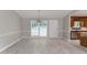 Bright and airy dining area with modern flooring and neutral color scheme at 803 Cedar Lake Se Dr, Conyers, GA 30094