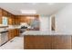 Spacious kitchen with stainless steel appliances, granite countertops, and ample cabinet space at 803 Cedar Lake Se Dr, Conyers, GA 30094